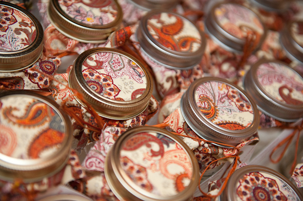 colorfully decorated mason fruit jars as wedding favors - photo by Houston based wedding photographer Adam Nyholt 